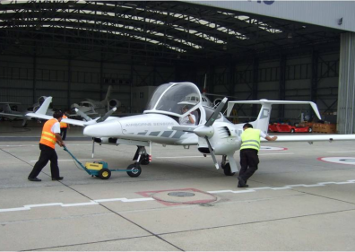 Moving a plane into the AAS Hangar @  Don Muang International Airport